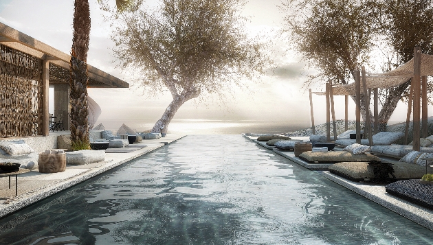 An outdoor swimming pool surrounded by seats and fog