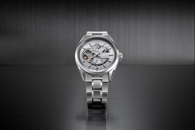 A silver metal watch
