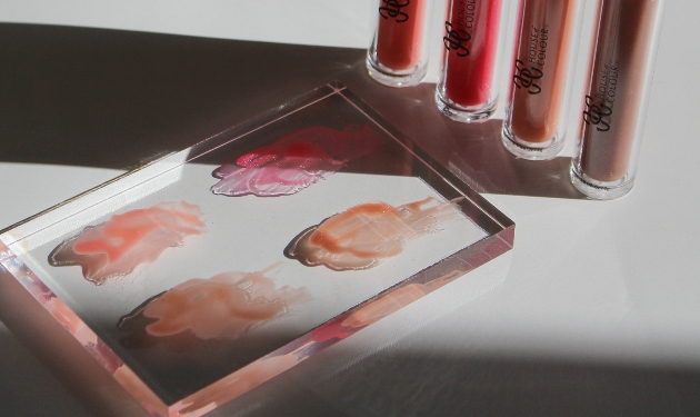 lip gloss samples on a glass sheet