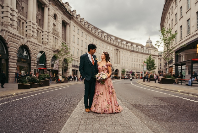 couple on wedding day in London street