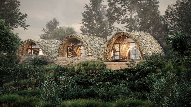 Three straw-covered huts